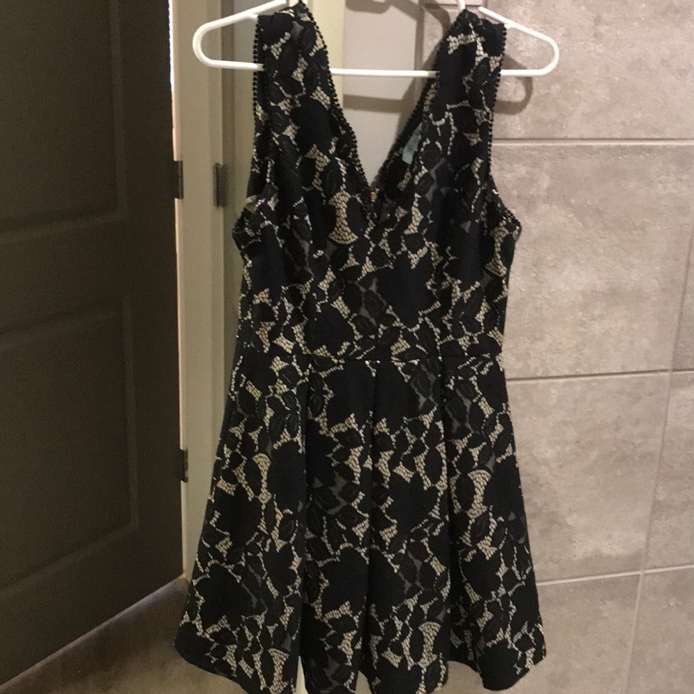 Black Lacey dress size medium. She and sky brand.